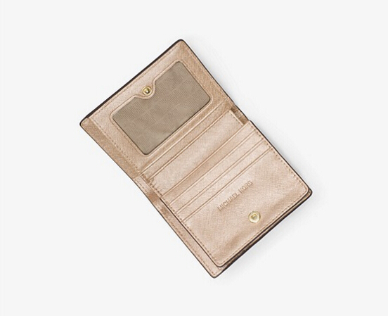 【直降$13！】MICHAEL Michael Kors Jet Set Tr*el 香槟色牛皮短钱夹 $49（约355元）