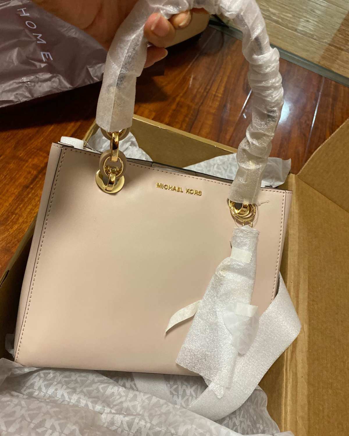 大概2折多买的mk小戴妃包.