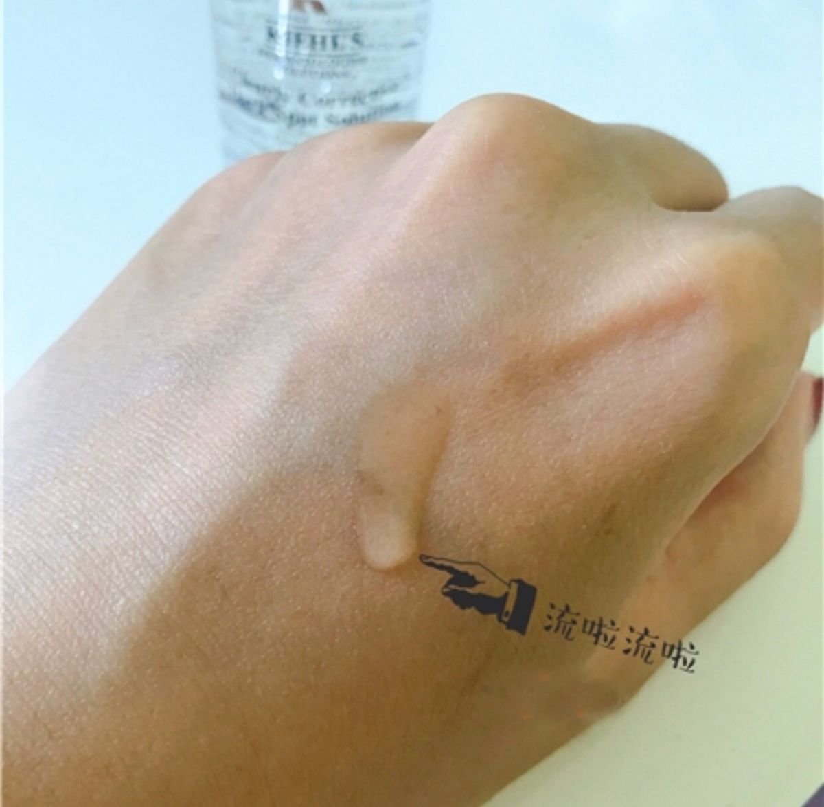 Kiehl's 集焕白均衡亮肤淡华液。没错，也就是