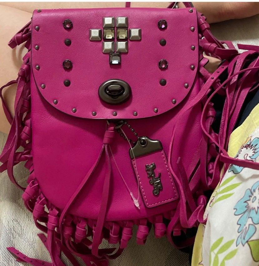 👉🏻 coach装饰性流苏包，像是波西米亚狂想曲  🟤