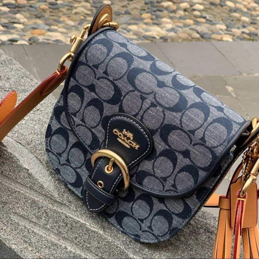 九月份的第一个包裹，收到了心水很久的coach香布蕾马鞍包 