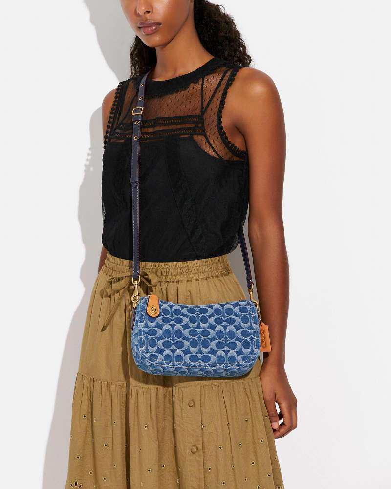 🌻剁手商品:Coach Swinger 23香布蕾丹宁牛仔