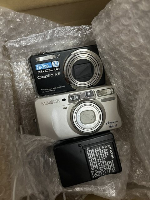 这次海淘到了一台胶片机和一台CCD（带电池充电器 合箱服务超