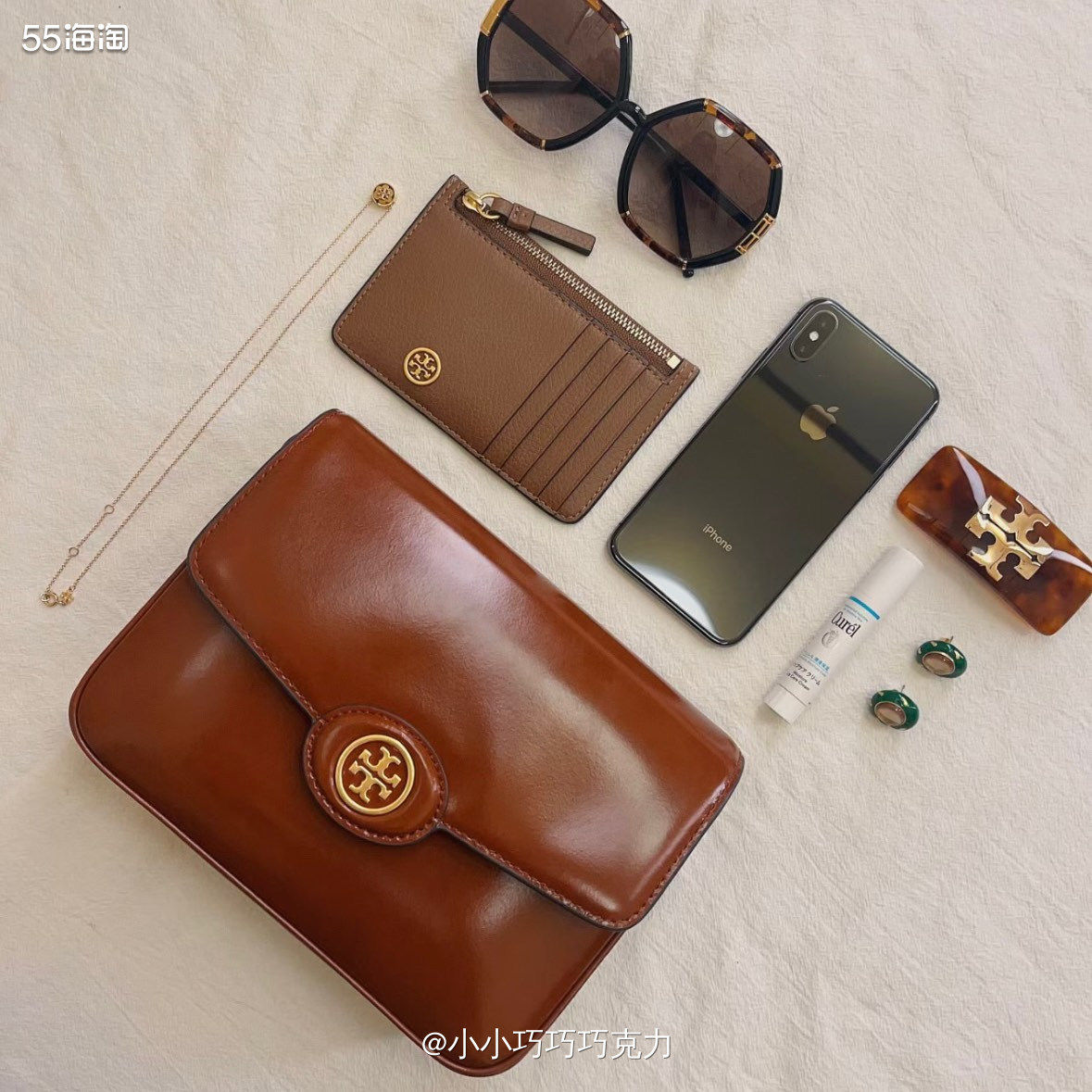 买过了coach、mk、tb的包包，相对来说感觉还是tb的质