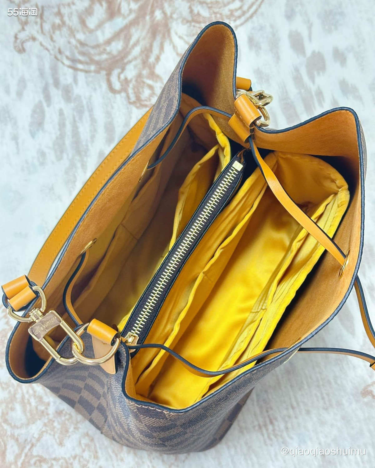 最近一直致力于给包包买各种配件，钱花了不少，但确实也提高了包