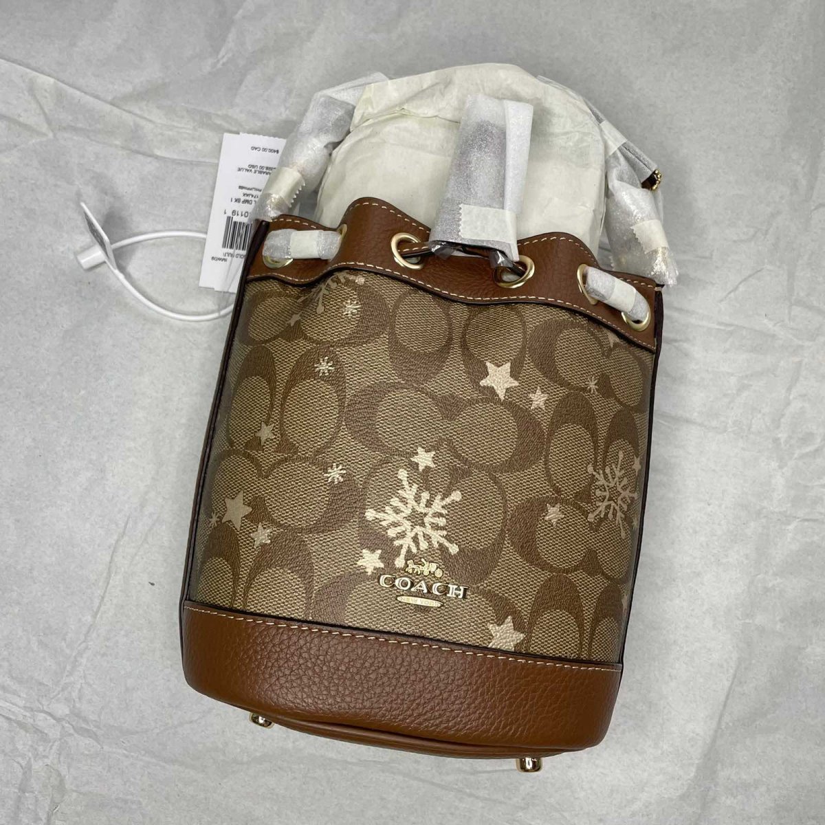 下单网站：coach奥莱 下**式：国卡+转运 包裹重量：1