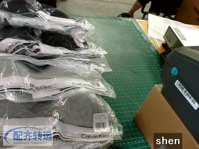 购买商品:7059内衣4件，黑背心1件，灰背心1件 转运公司