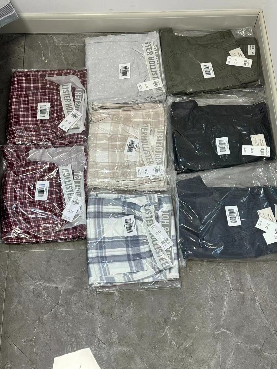 购买商品:格子裤5，工装裤x3 转运公司:转运国际 转运运费